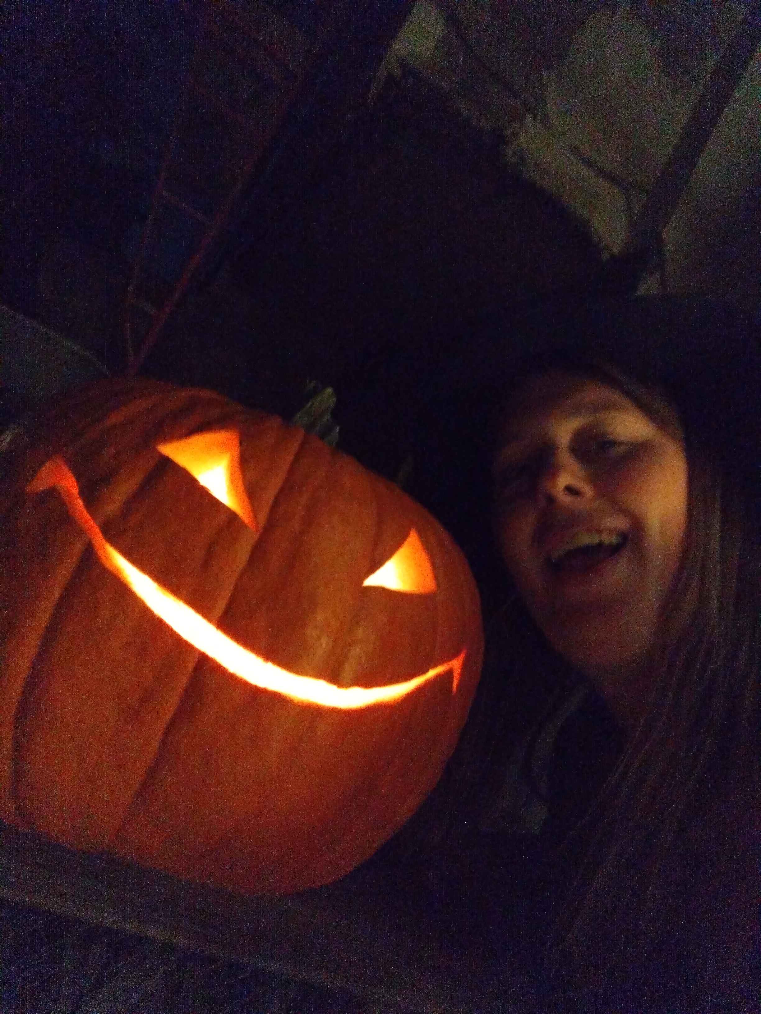 Selfie style photo of Blush and her pumpkin from 2024